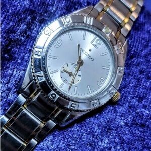 Movado Gentry Swiss 81E91850 Classy Women's Watch 2 Tone